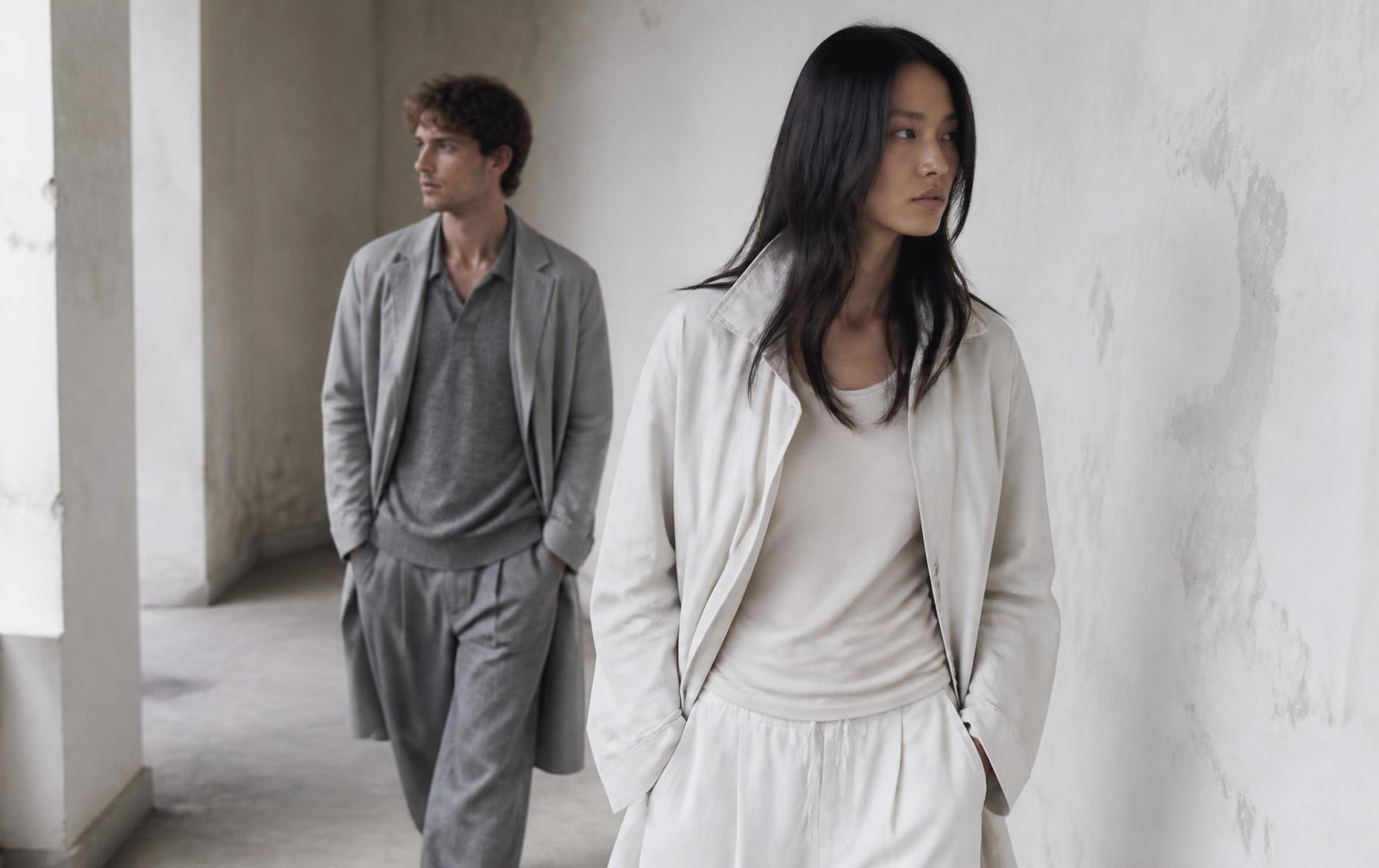 Two models in muted grey and off-white minimal streetwear